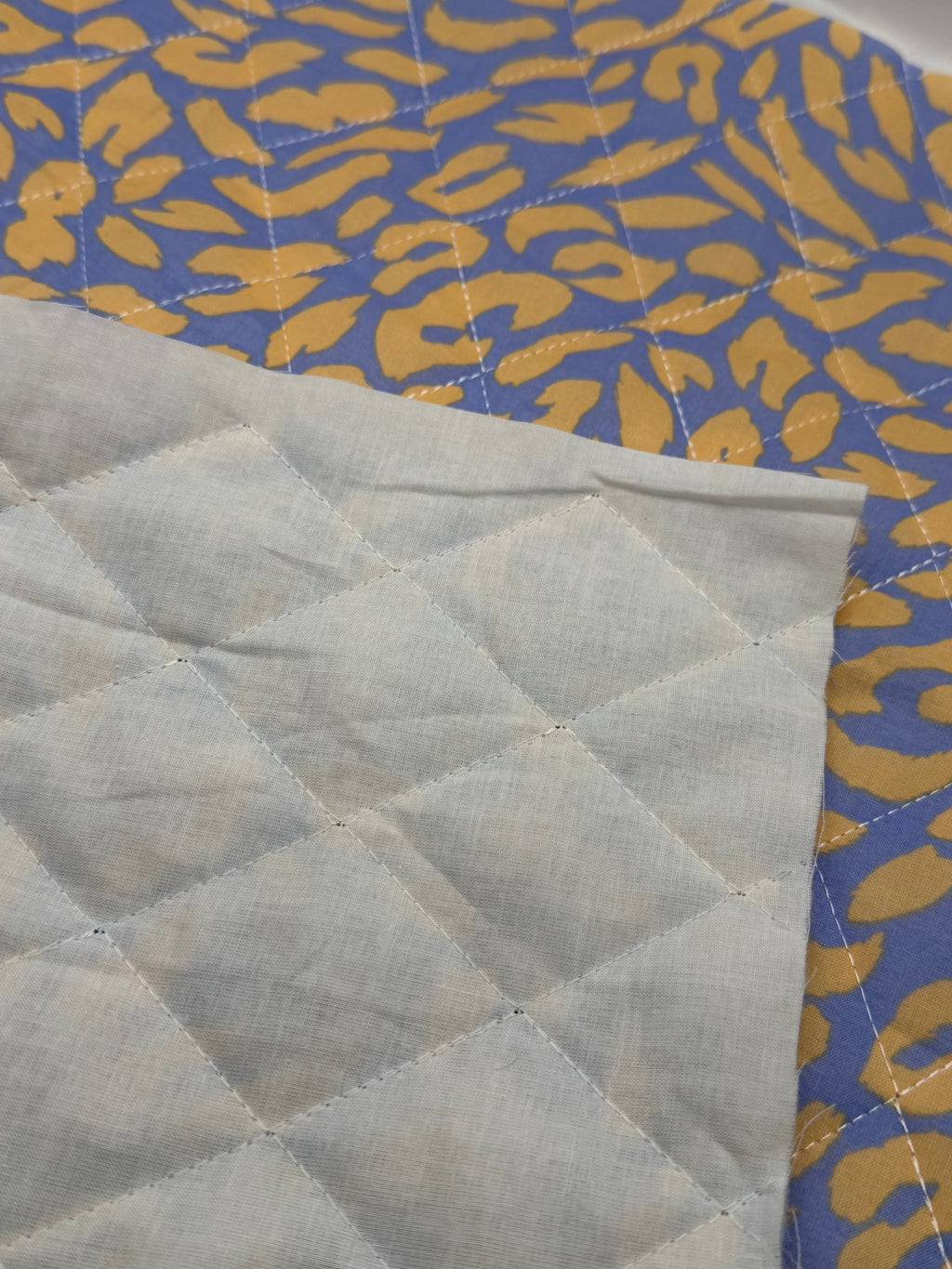 Cotton Pre Quilted Fabric - Blue Animal Print