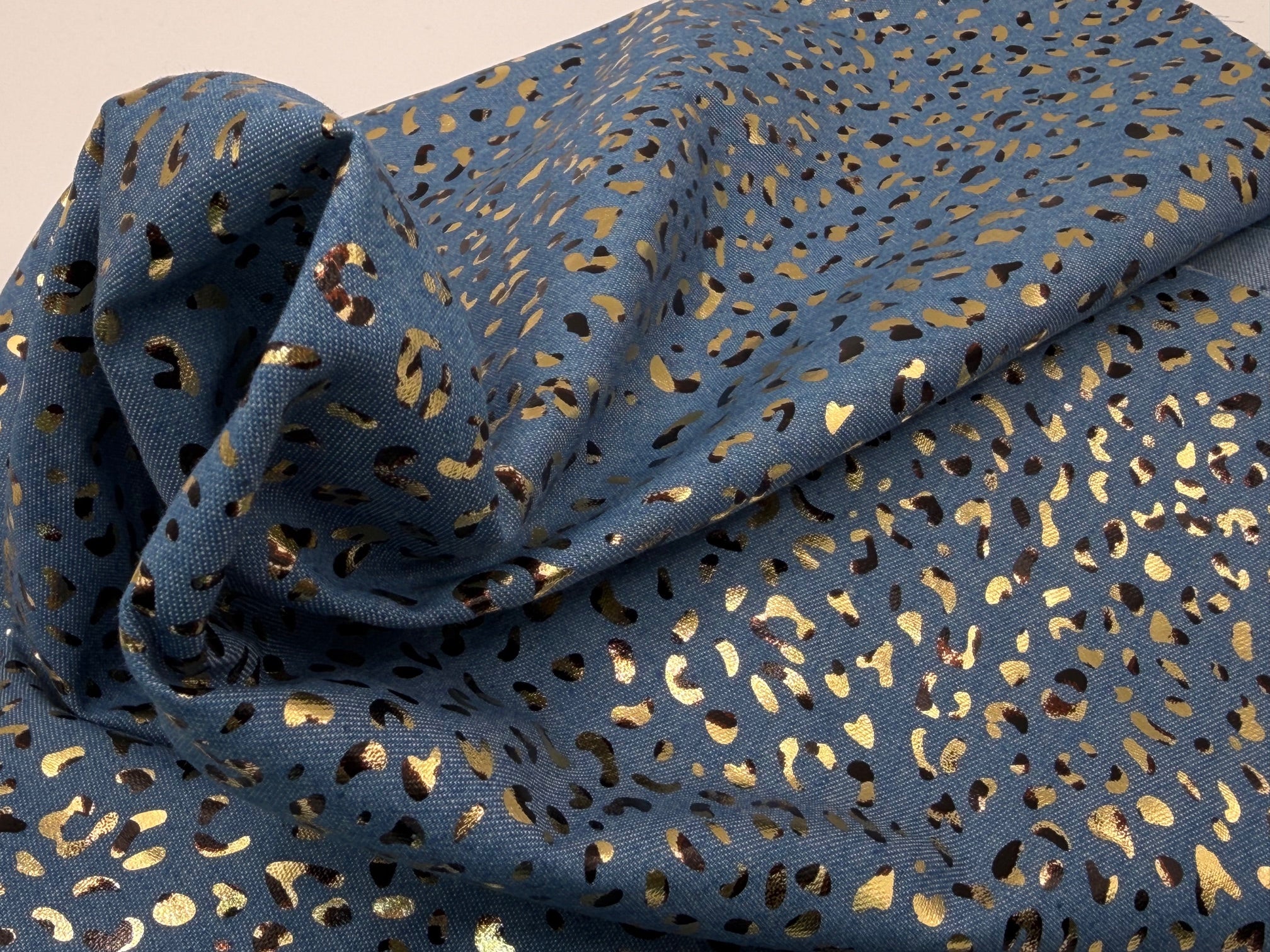 Denim Foiled Leopards Fabric